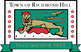 A green and white Logo saying the Town of Richmond Hill. There is a lion underneath the title with red flowers on either side. At the bottom is a banner saying Incorporated 1878.